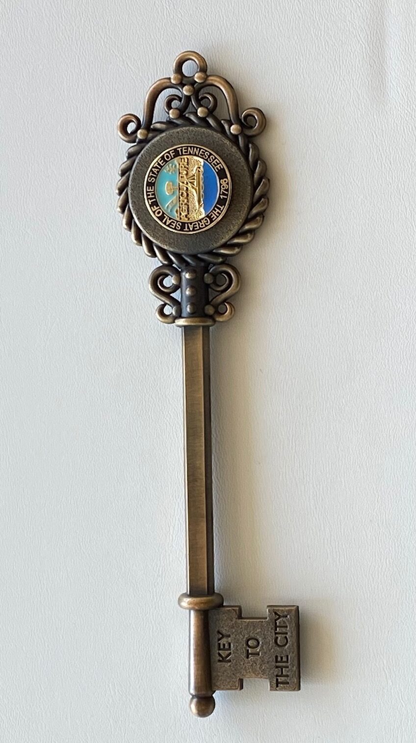 KEY WITH STATE OF TENNESSE #4 SEAL - ER Badge